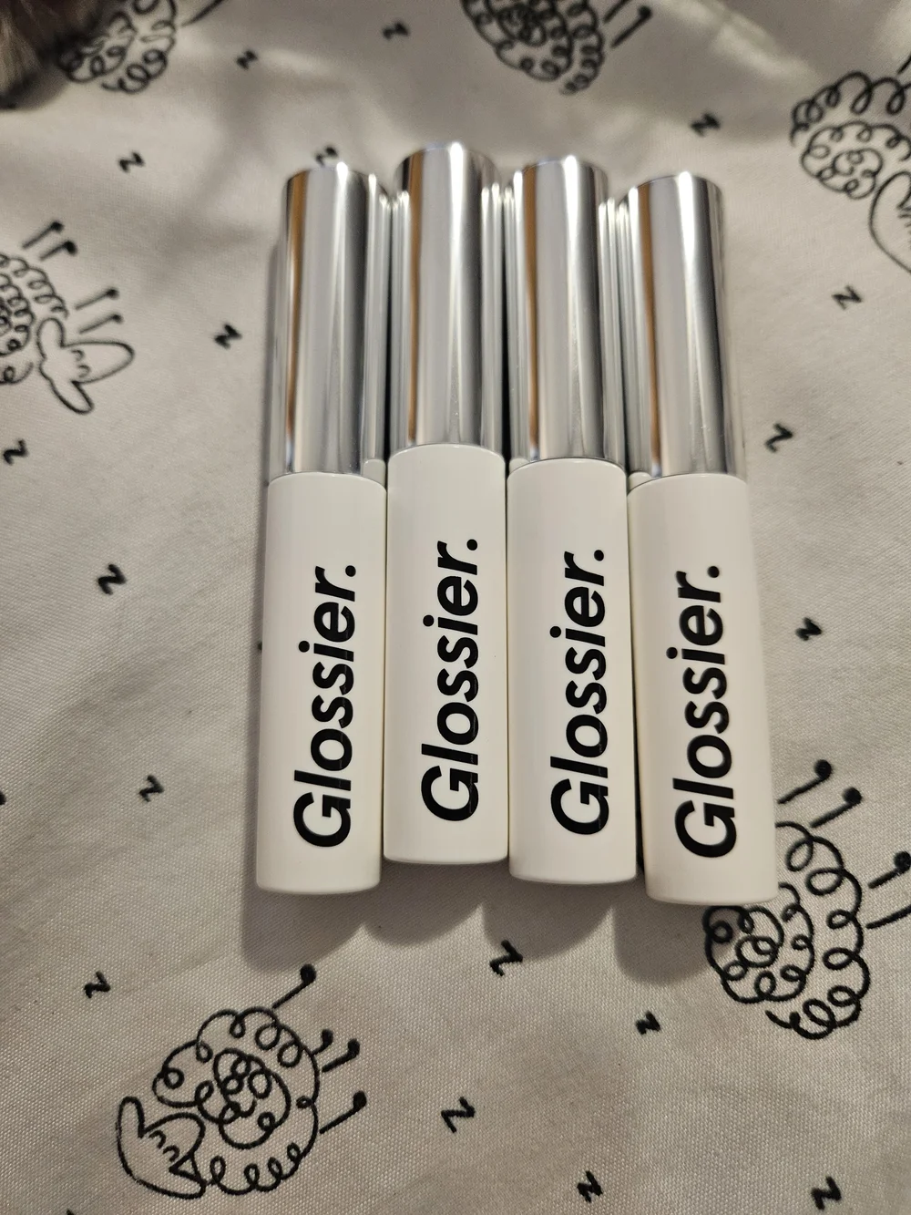 4 Glossier Lash Serums full size